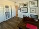 Functional office with a large workspace, ample storage, and unique wall decor at 600 N Carriage Hill Dr # 1082, Las Vegas, NV 89138