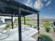 Inviting community picnic area with a pergola and mountain views at 600 N Carriage Hill Dr # 1082, Las Vegas, NV 89138