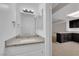 Modern bathroom featuring granite counters, and contemporary fixtures at 6299 W Washington Ave, Las Vegas, NV 89107