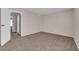 Spacious bedroom with neutral carpeting, offering a comfortable and serene living space at 6299 W Washington Ave, Las Vegas, NV 89107