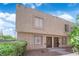 Two story townhome showcasing a modern design and low-maintenance landscaping at 6299 W Washington Ave, Las Vegas, NV 89107