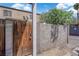 Wooden gate that provides entry to a residential backyard or patio space at 6299 W Washington Ave, Las Vegas, NV 89107
