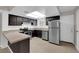Well-equipped kitchen featuring granite countertops and stainless steel appliances at 6299 W Washington Ave, Las Vegas, NV 89107