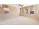 Spacious bedroom with carpet flooring, large windows offering plenty of natural light at 7098 Seabirds Pl, North Las Vegas, NV 89084