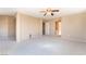 Large bonus room featuring plush neutral carpet, neutral paint, and access to the hall and closet at 7098 Seabirds Pl, North Las Vegas, NV 89084