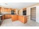 Well-appointed kitchen with a central island, stainless steel appliances, and granite countertops at 7098 Seabirds Pl, North Las Vegas, NV 89084