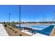 Community basketball court with multiple hoops surrounded by landscaped grounds at 7384 Hayes Harbor Ct # Lot 213, North Las Vegas, NV 89084
