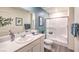 Modern bathroom with a white vanity, framed mirror, and glass-enclosed shower at 7384 Hayes Harbor Ct # Lot 213, North Las Vegas, NV 89084