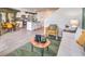 Open-concept living space with modern furnishings, an island, and contemporary kitchen design at 7384 Hayes Harbor Ct # Lot 213, North Las Vegas, NV 89084