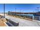 Community pickleball court and seating area, fenced, featuring mountain views at 7384 Hayes Harbor Ct # Lot 213, North Las Vegas, NV 89084