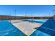 Community pickleball court, fenced, featuring mountain views and lighting at 7384 Hayes Harbor Ct # Lot 213, North Las Vegas, NV 89084