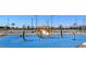 Community playground featuring modern play structures and basketball court in a vibrant outdoor setting at 7384 Hayes Harbor Ct # Lot 213, North Las Vegas, NV 89084