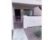 Private patio with a metal gate, leading to front door at 805 Rock Springs Dr # 101, Las Vegas, NV 89128