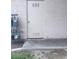Utility door to building with meters and textured stucco wall at 805 Rock Springs Dr # 101, Las Vegas, NV 89128