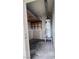 Small utility room with water heater and shelving unit at 805 Rock Springs Dr # 101, Las Vegas, NV 89128