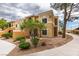 Exterior of building features well-maintained landscaping, accessible entrance, and neutral color scheme at 8070 W Russell Rd # 2026, Las Vegas, NV 89113