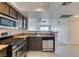 Well-equipped kitchen featuring stainless steel appliances and granite countertops at 8070 W Russell Rd # 2026, Las Vegas, NV 89113
