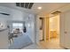 Bright open-concept living space connecting the kitchen and living area at 8070 W Russell Rd # 2026, Las Vegas, NV 89113
