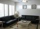 Stylish living room offers comfortable seating, plantation shutters, and a decorative coffee table at 8139 Retriever Ave, Las Vegas, NV 89147