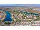 Extensive aerial shot of the residential community nestled around a network of interconnected lakes at 8404 Shore Breeze Dr, Las Vegas, NV 89128