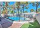 Inviting backyard with a fenced pool area and mature desert landscaping at 8404 Shore Breeze Dr, Las Vegas, NV 89128