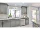 Updated kitchen featuring granite counters and stainless appliances at 8404 Shore Breeze Dr, Las Vegas, NV 89128