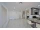 Bright area showcasing the modern kitchen and adjacent living area at 8404 Shore Breeze Dr, Las Vegas, NV 89128
