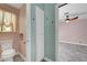 Cozy bathroom featuring a toilet, a linen closet, and access to an adjacent bedroom at 8705 Orvieto Dr, Las Vegas, NV 89117