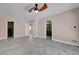 Large bedroom with multiple doorways for natural light and easy access to other rooms at 8705 Orvieto Dr, Las Vegas, NV 89117