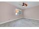 Bright bedroom with a ceiling fan and a window allowing for natural light at 8705 Orvieto Dr, Las Vegas, NV 89117