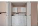 Laundry room features a washer and dryer behind a double door at 8705 Orvieto Dr, Las Vegas, NV 89117