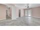 Bright living room with white trim and tile floors at 8705 Orvieto Dr, Las Vegas, NV 89117