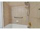 Shower stall features hand rails and traditional fixtures at 8705 Orvieto Dr, Las Vegas, NV 89117