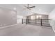 Spacious loft with ceiling fans, mini-kitchen, and stair access at 8797 Pinley Spring St, Las Vegas, NV 89113