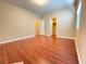 Spacious bedroom with hardwood floors, neutral colored walls, and white trim at 9138 Hermosa Valley St, Las Vegas, NV 89178