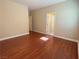 Bedroom with hardwood floors, neutral colored walls, white trim and doorways at 9138 Hermosa Valley St, Las Vegas, NV 89178