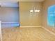 Neutral dining room featuring tile flooring and an elegant chandelier at 9138 Hermosa Valley St, Las Vegas, NV 89178