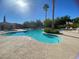 Community pool with sun loungers and a splash pad at 9138 Hermosa Valley St, Las Vegas, NV 89178