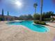 Community pool featuring palm trees, lounge chairs, and a splash pad at 9138 Hermosa Valley St, Las Vegas, NV 89178