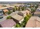 Aerial view of neighborhood featuring multiple homes, streets and desert landscaping at 9823 Belle Marie Ct, Las Vegas, NV 89141