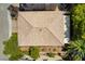 A high angle view of the roof, yard, and close by neighborhood at 9823 Belle Marie Ct, Las Vegas, NV 89141