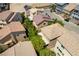 Aerial view of neighborhood featuring multiple homes, streets and desert landscaping at 9823 Belle Marie Ct, Las Vegas, NV 89141