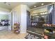 Elegant bathroom with a glass-enclosed shower, granite countertops, and access to the bedroom for convenience at 9823 Belle Marie Ct, Las Vegas, NV 89141