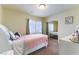 Cozy bedroom featuring mirrored closet doors, soft lighting, and a comfortable bed perfect for relaxation at 9823 Belle Marie Ct, Las Vegas, NV 89141