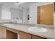 This bathroom has a double sink vanity with a large mirror and a view of the shower at , Henderson, NV 89011
