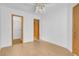 Light and airy bedroom featuring wood-look floors and access to closet at , Henderson, NV 89011