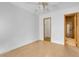 Bright bedroom with natural light, ceiling fan, and view to bathroom and walk-in closet at , Henderson, NV 89011