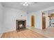View of living room with the fireplace and view into the kitchen at , Henderson, NV 89011