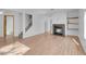 Bright and inviting living room features a cozy fireplace and wood flooring at , Henderson, NV 89011