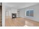 Bright living room features a fireplace, wood flooring, and natural light at , Henderson, NV 89011